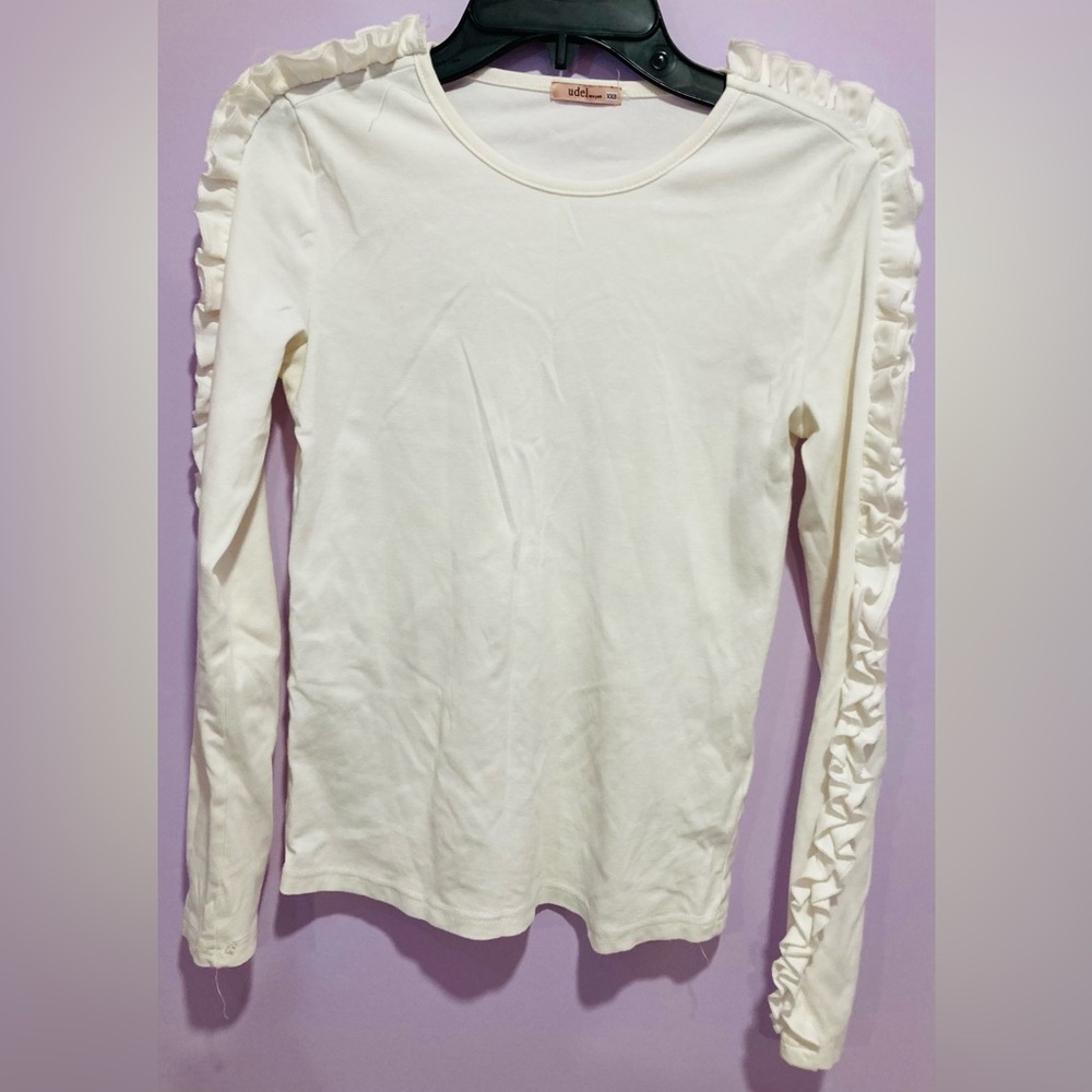 White ruffled long sleeve top